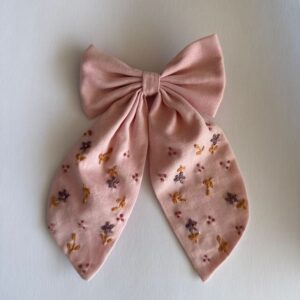 Minimal embroidered tail bow
