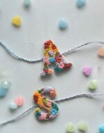Initial Rakhi