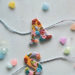 Initial Rakhi