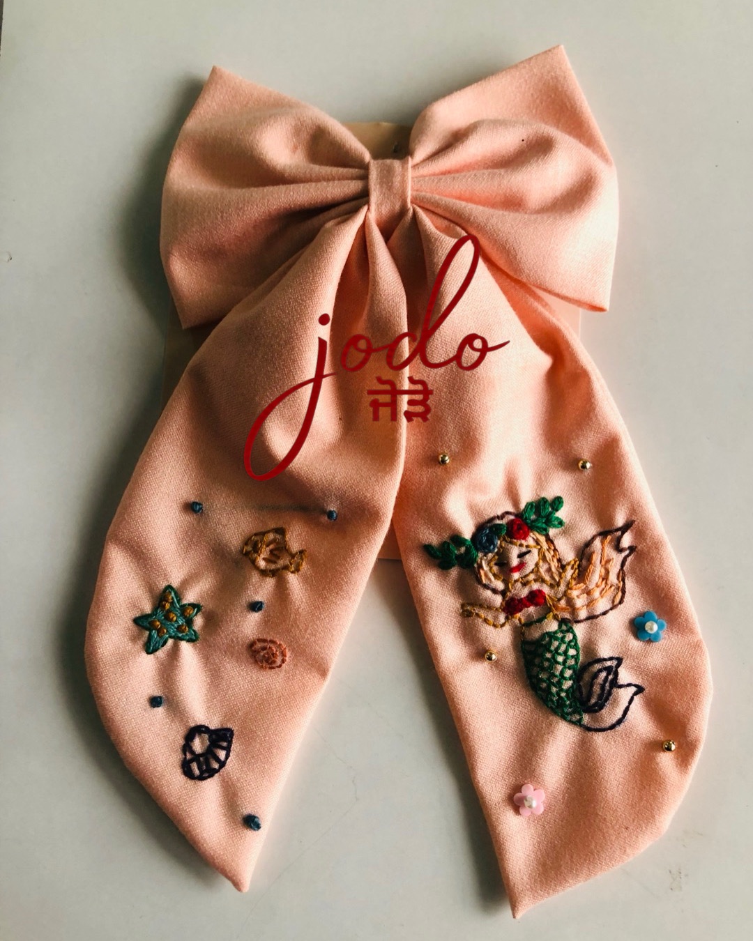 b55b2843-3594-43ff-a4e4-867392569d8f Mermaid customised bow - Image 1